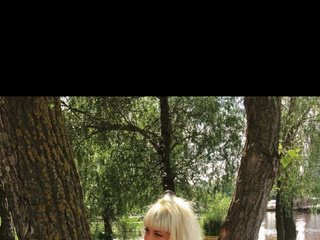 On the beach, in a pink pareo