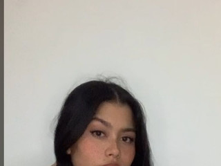 A smile that teases, a gaze that pleases.