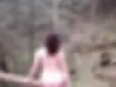 Naked on a log