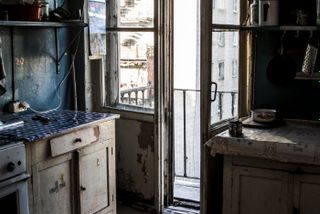 Pay off the apartment debts.