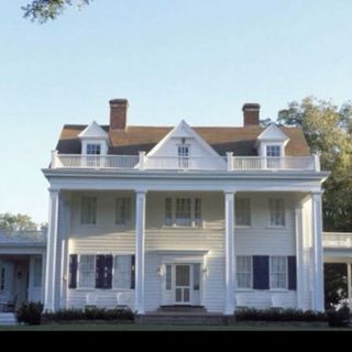 The house with the blue shutters